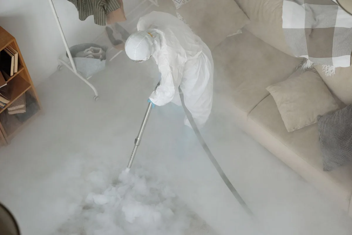 Biohazard cleanup technician in protective equipment, Silverthorne, CO
